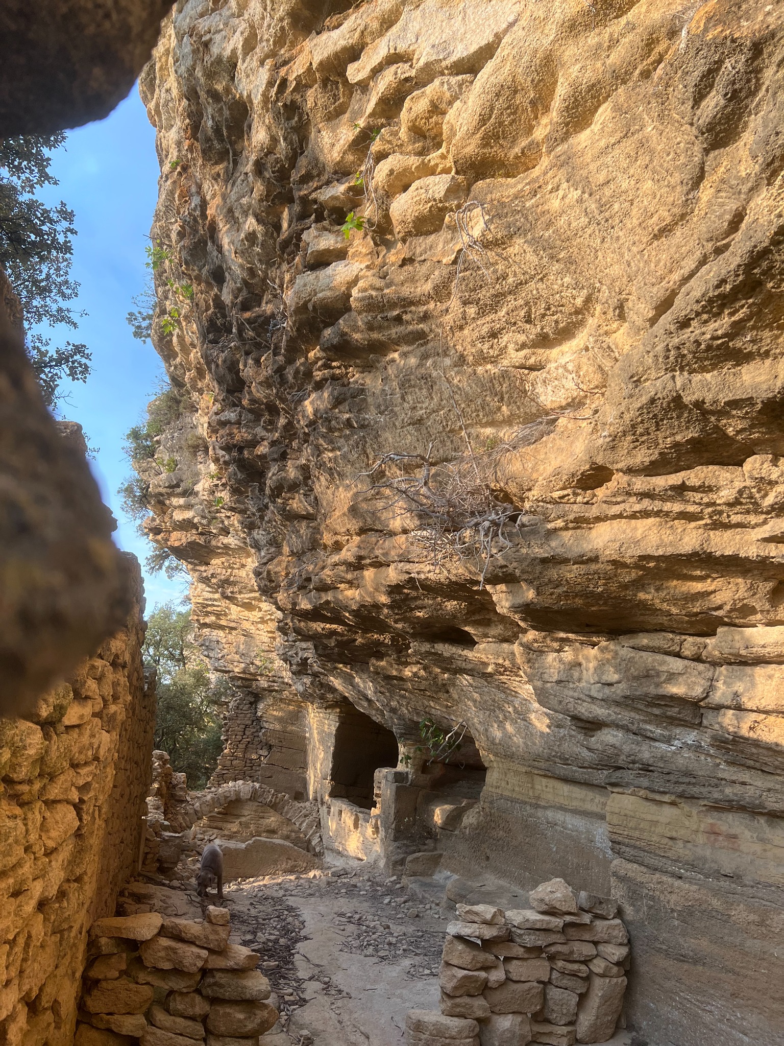 A passage between ochre rock formations