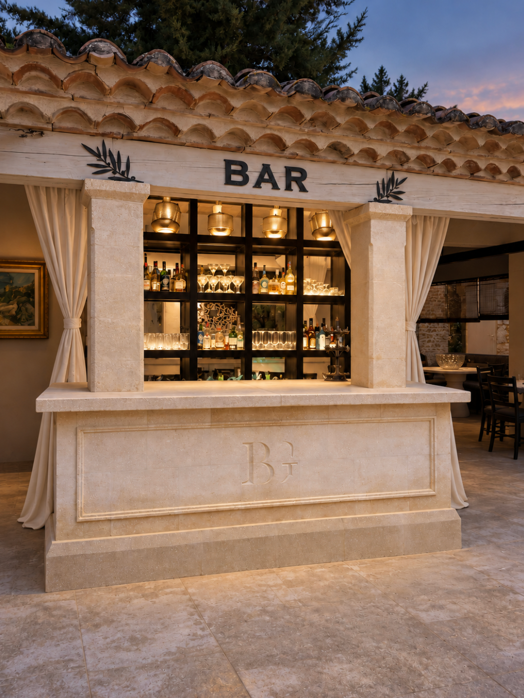 Elegant illuminated outdoor bar at Basti’de Garriga