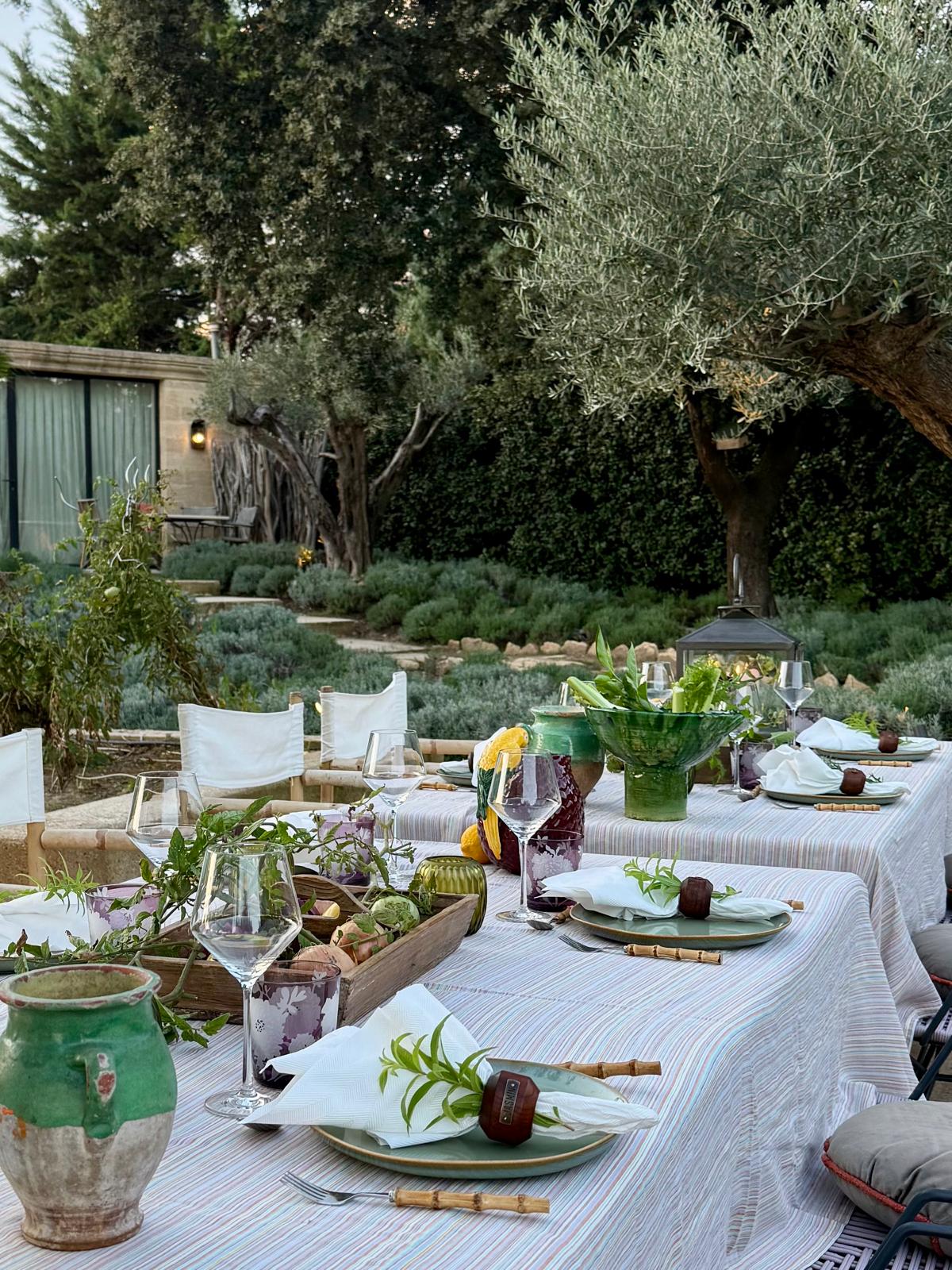A table set beside the potager