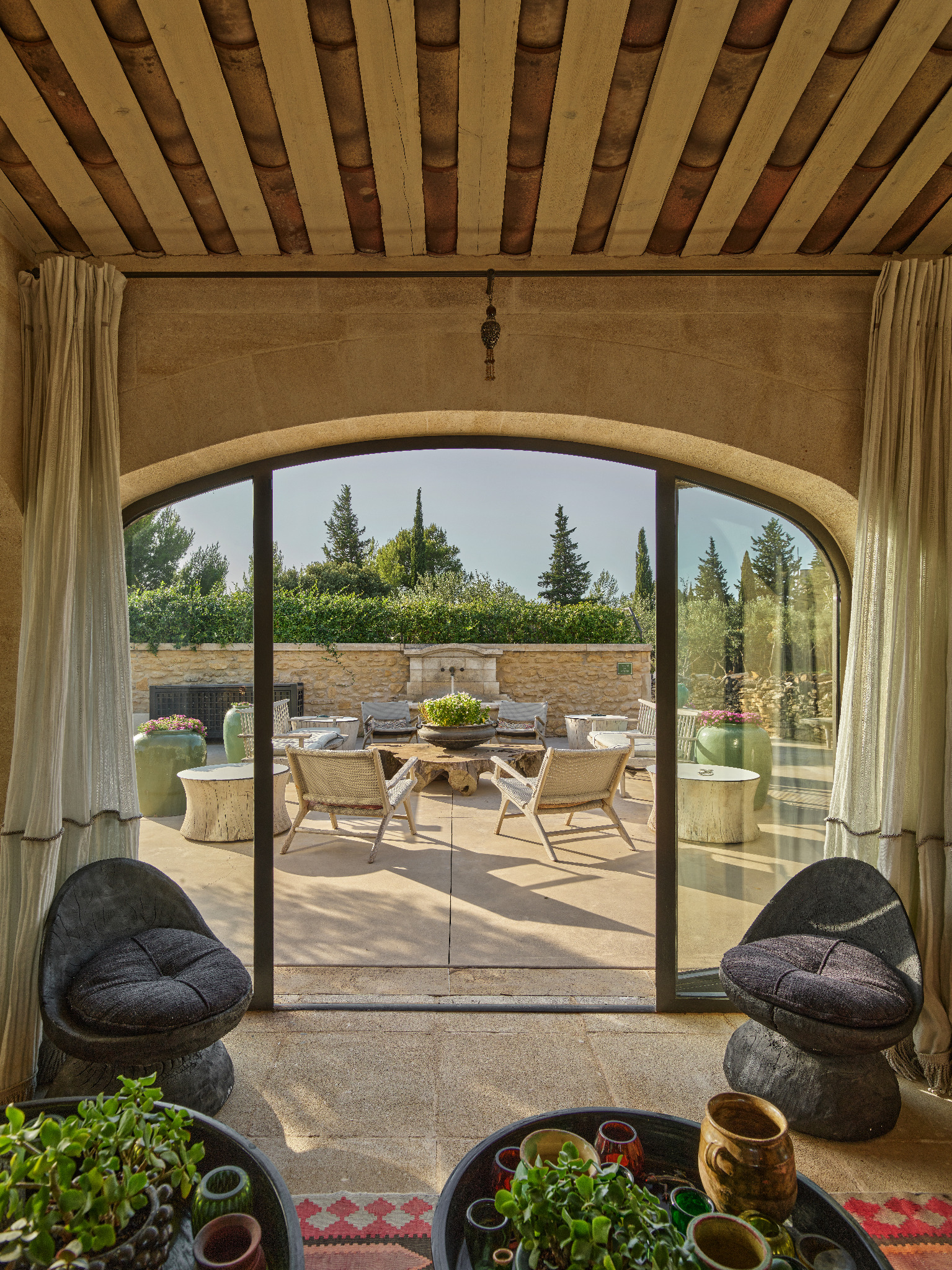 Lounge overlooking the sunlit terrace